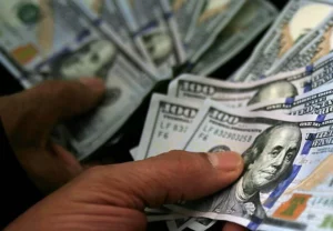 Dólar à vista cai para R$ 5,87 nesta sexta-feira, alta no preço do petróleo e do ferro favoreceu moedas emergentes